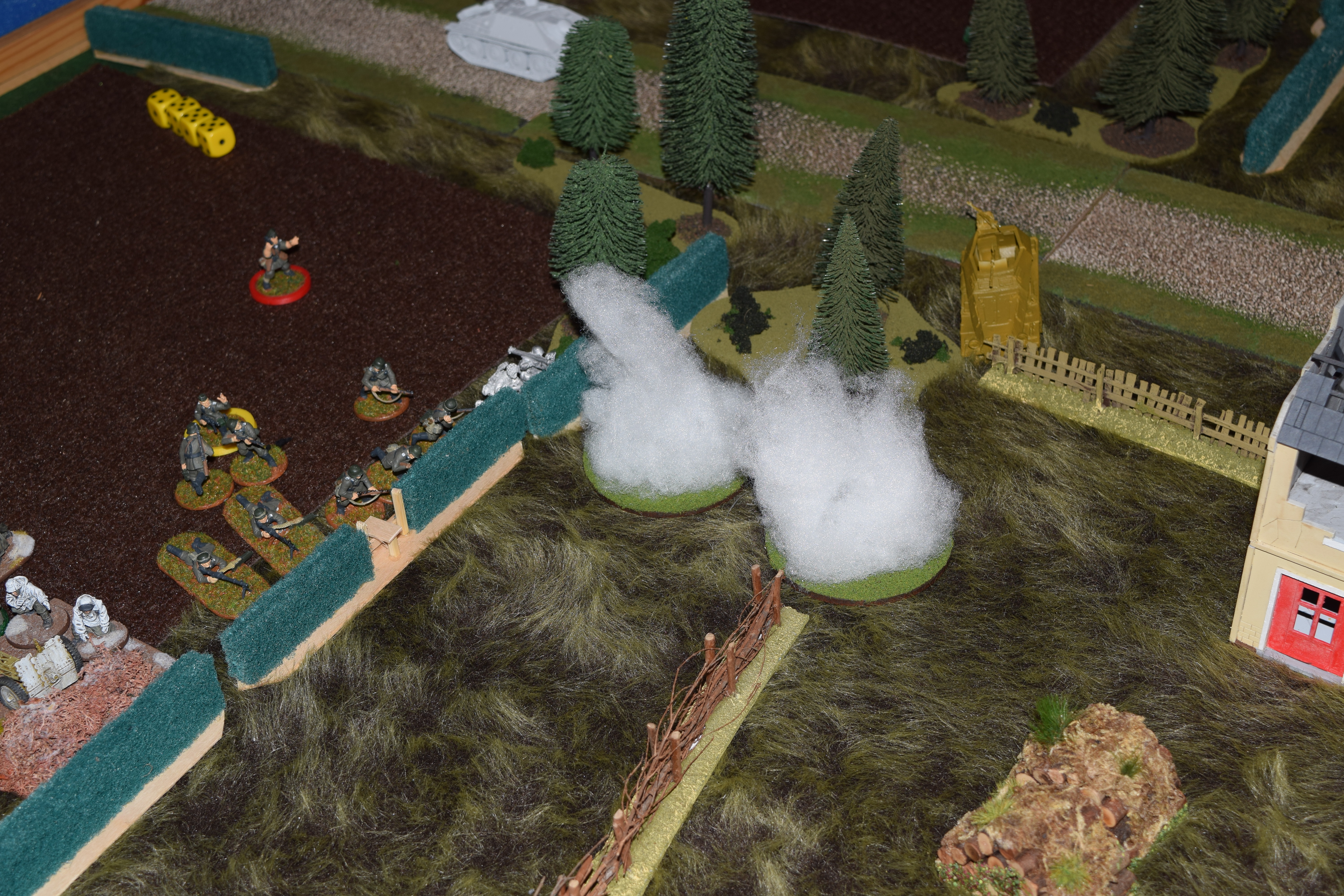 The Panzerschreck team hides behind smoke