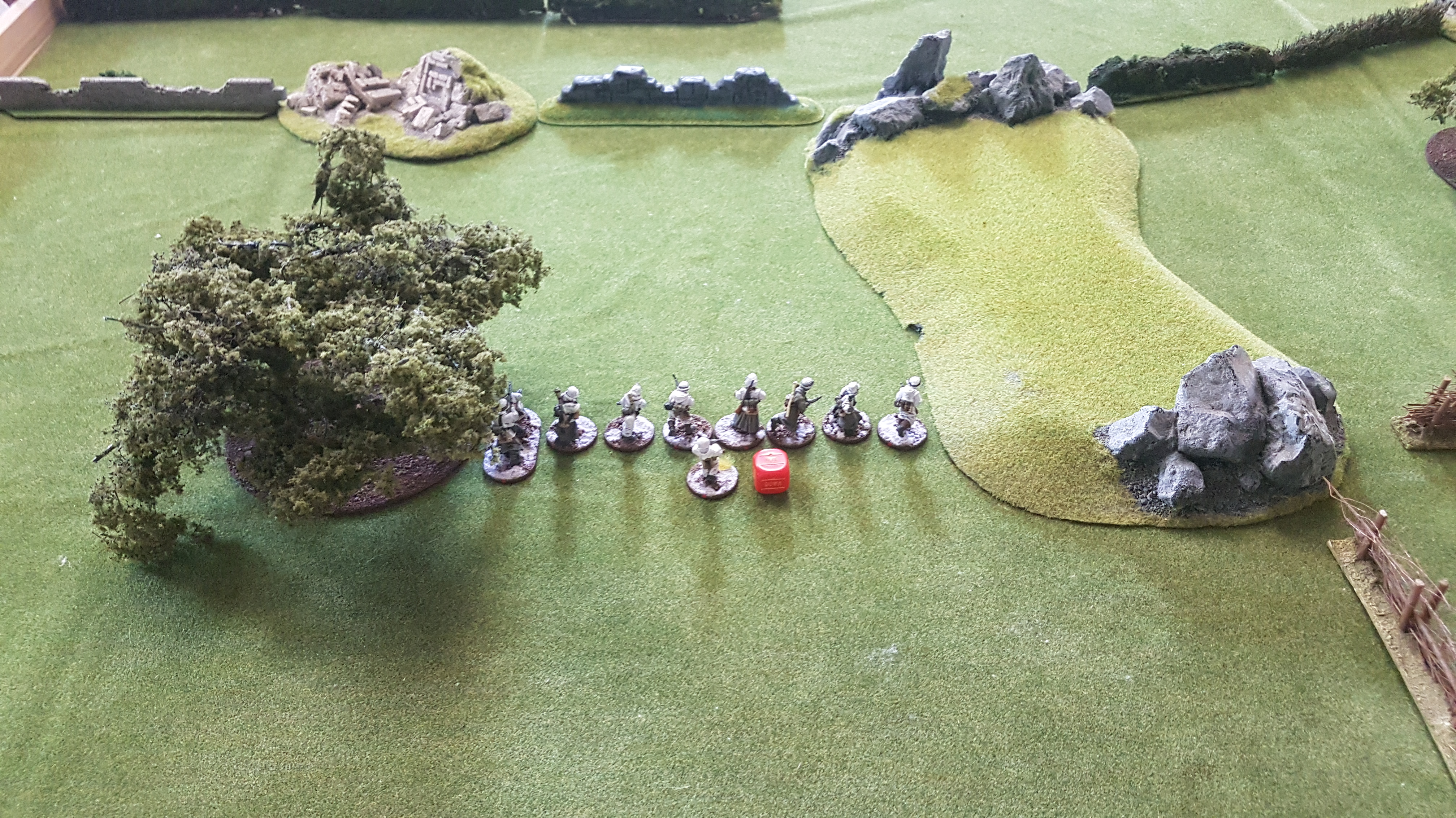 The Germans get the first die out of the bag and deploy one of their infantry sections.