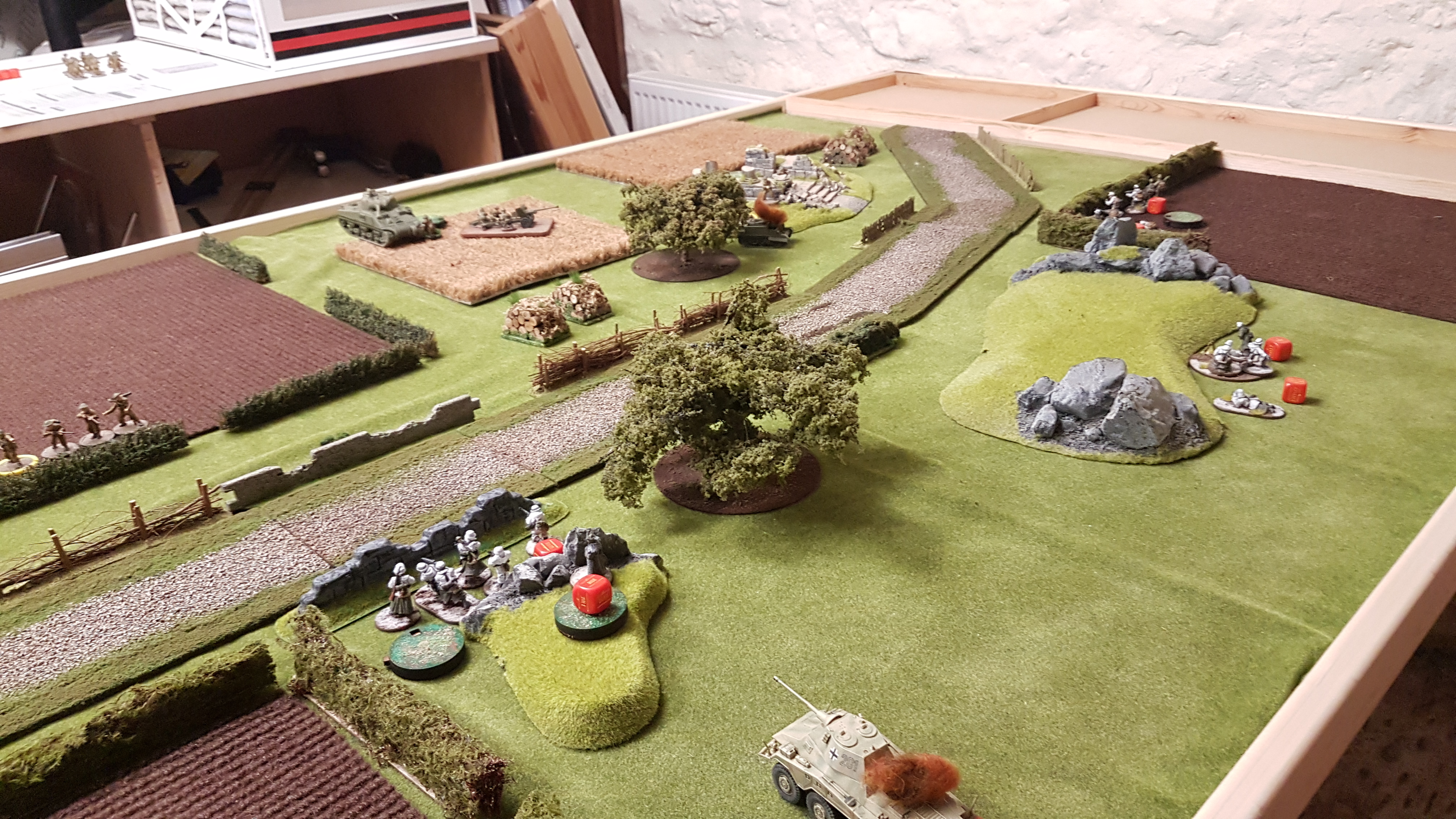 The remaining German infantry try to hold out with the Medium Mortar team providing HE support against the British on the Right flank.