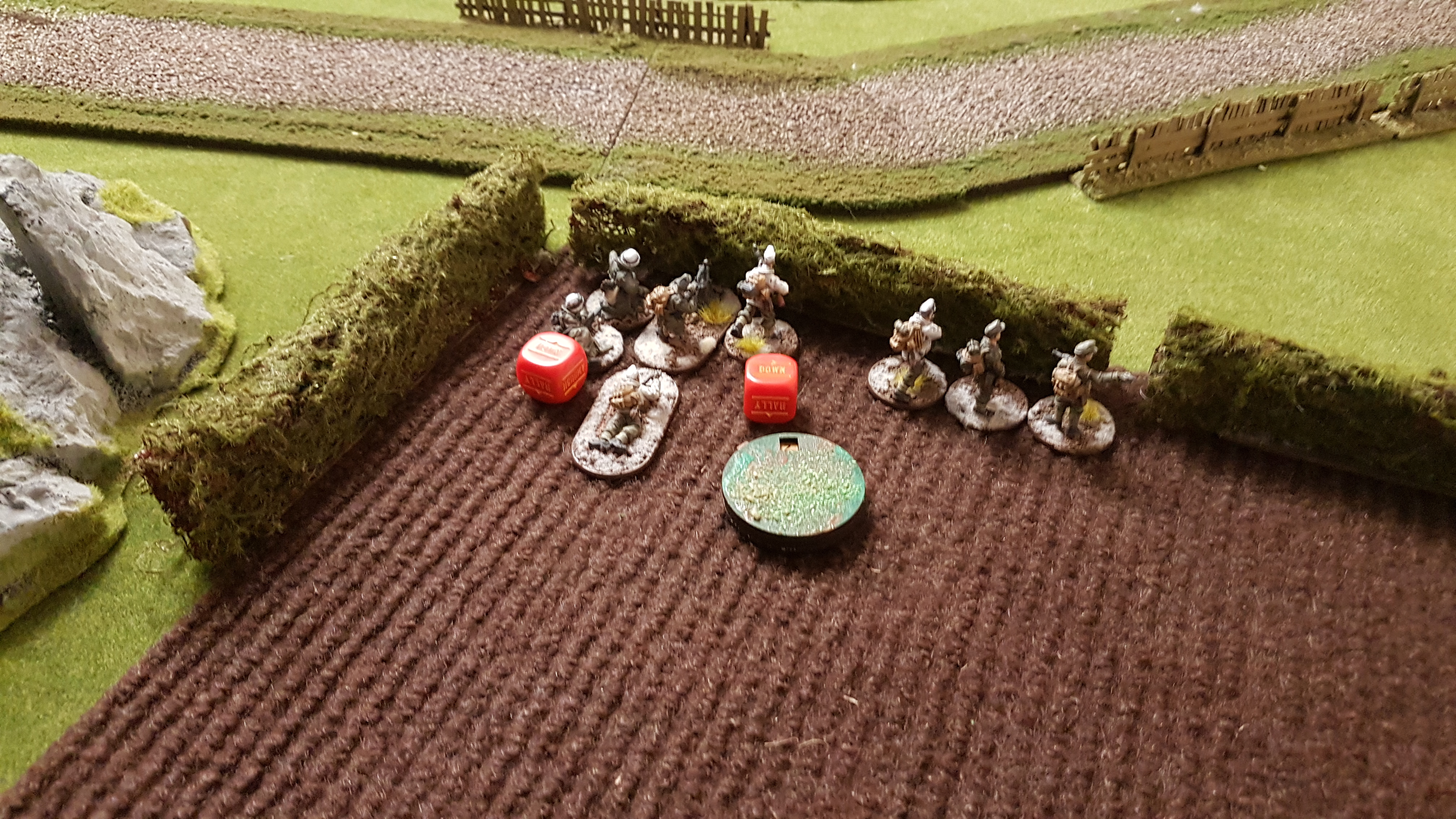 The German Mountain infantry protect the Flamethrower team but due to it's short range it is unable to get in position and fire without it being a suicide mission. 
