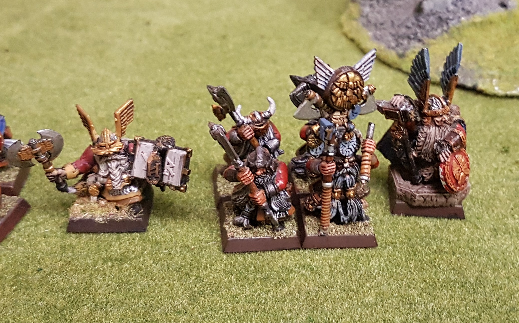 Dwarven Rune Priest, Hearthguard and Warlord survey the coming battle.