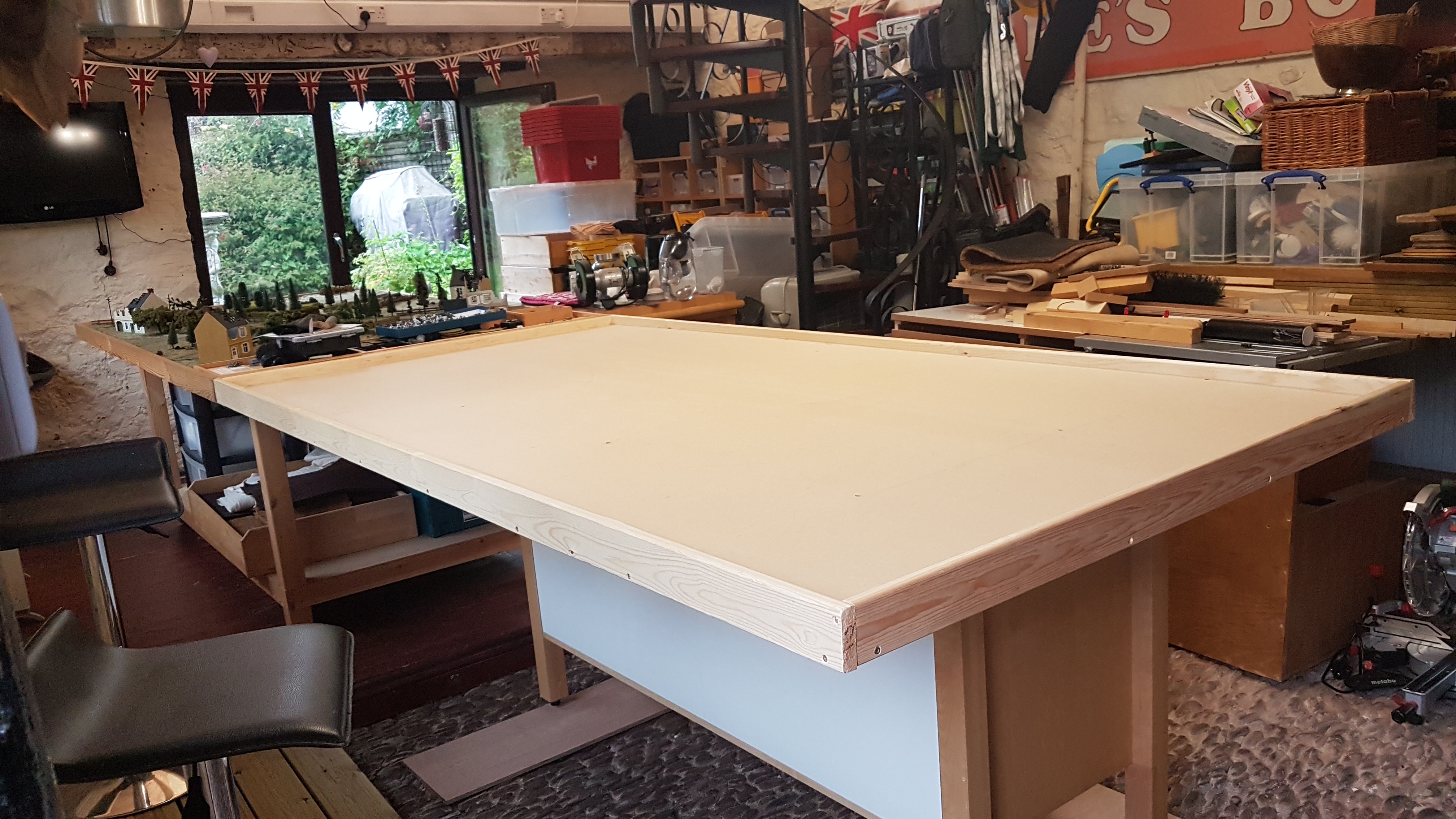 Second table with tilting top down.